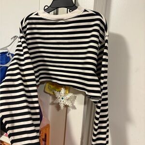Black and White Striped Cropped Sweatshirt with gold writing Nike on the front